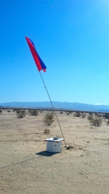 Flags help migrants find water in the desert.